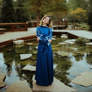 Royal blue 70’s prairie dress with ruffle detail!